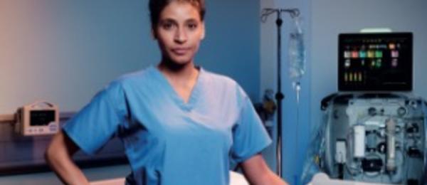 Nurse in ICU room